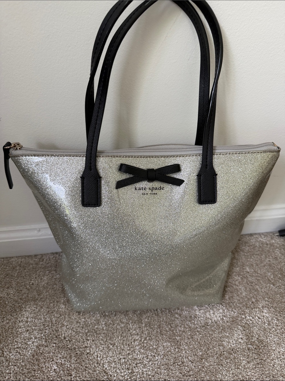 kate spade Silver Glitter Tote with Black Bow and Handles